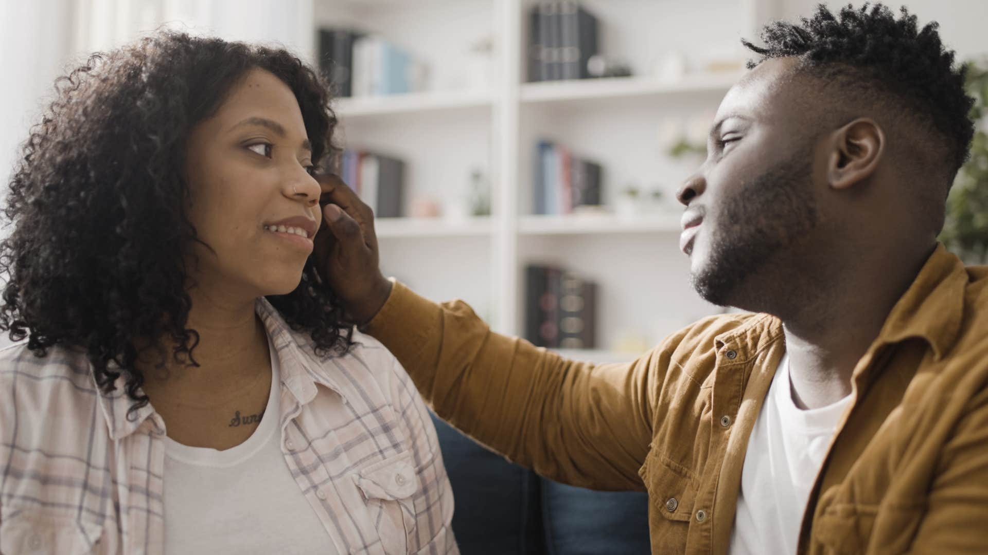 Man comforting his wife and saying "we'll get through this together."