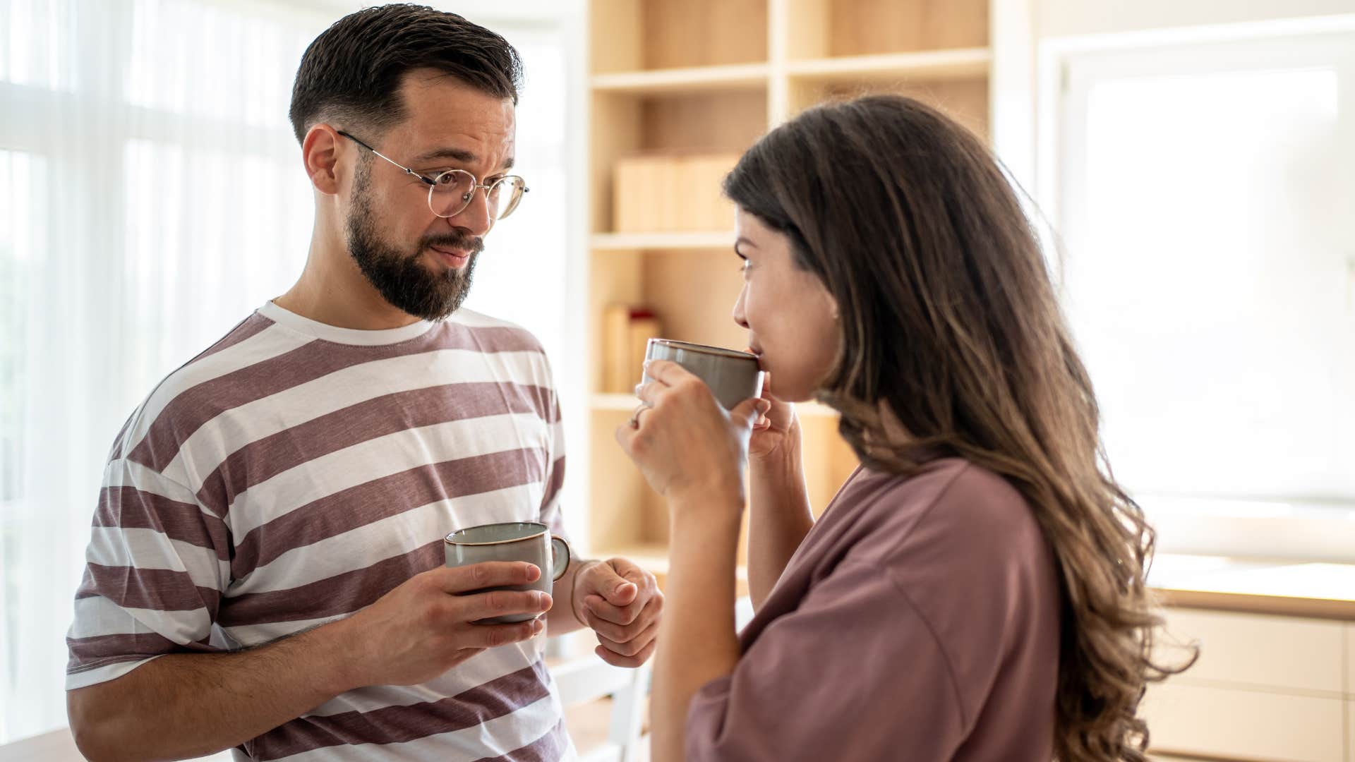 Man saying "I've got a lot going on today" to his wife.