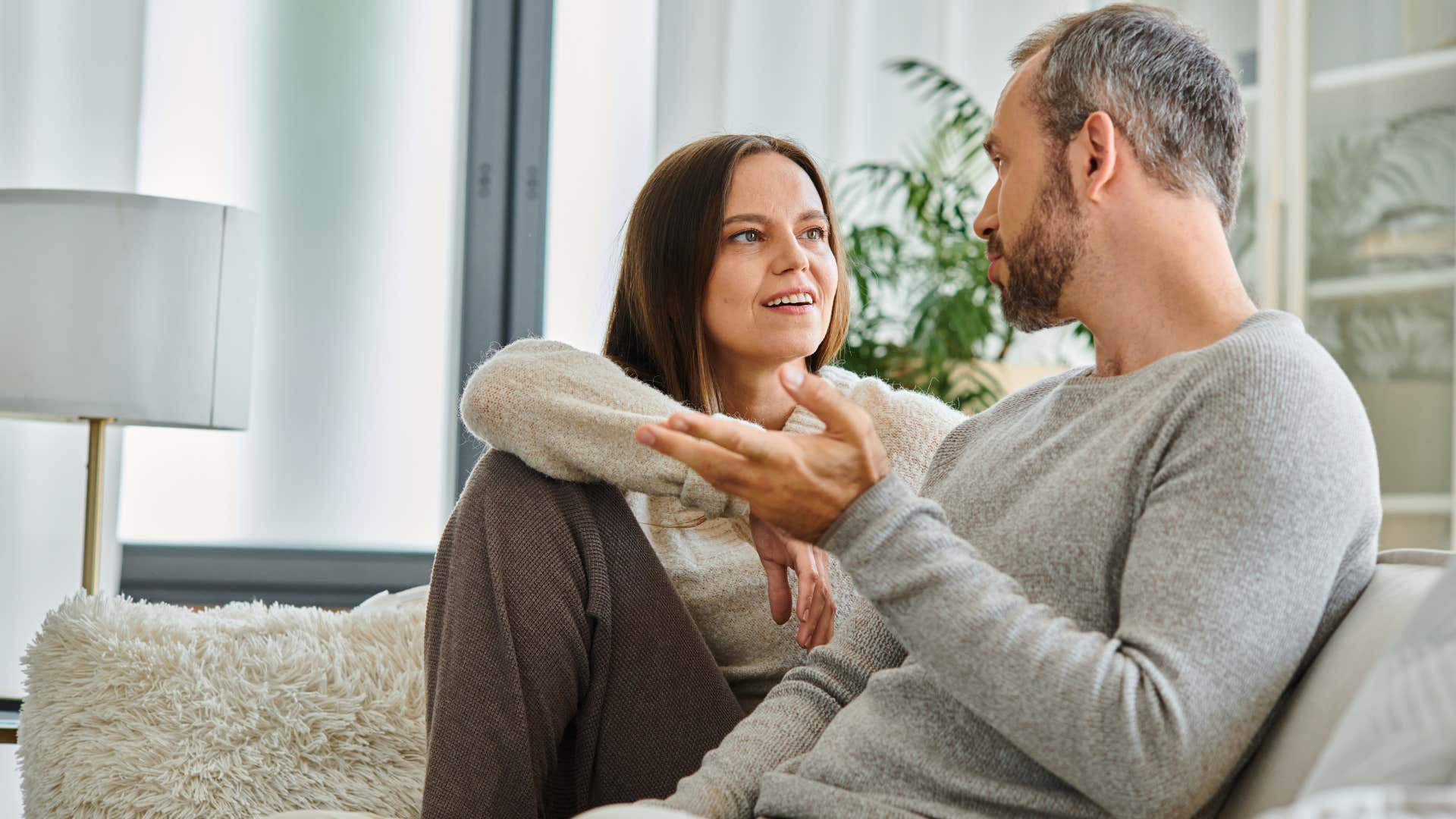 Man saying "I'm proud of you" to his wife.