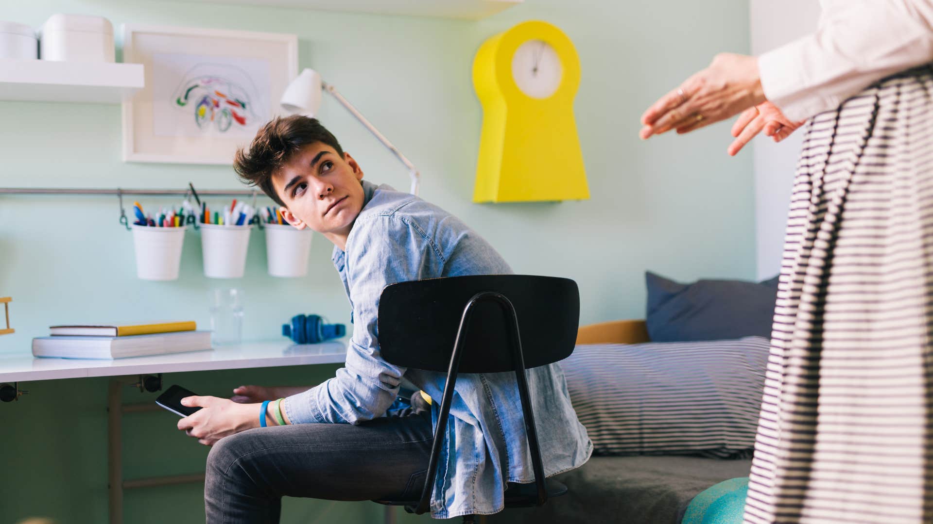 teenage boy not listening to parent's advice