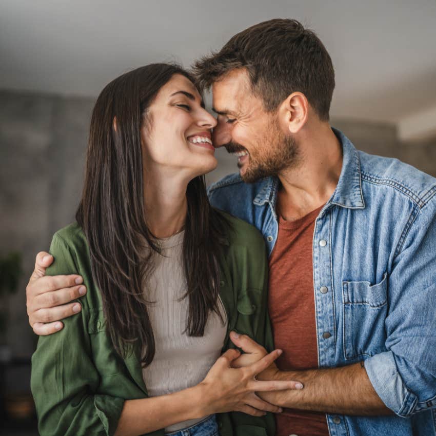 couple who truly loves each other as they make physical contact before bedtime