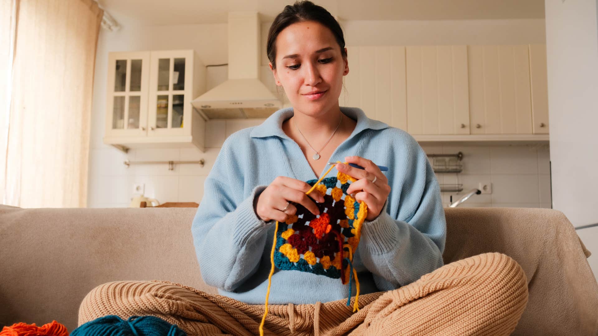 frugal woman knitting homemade bag