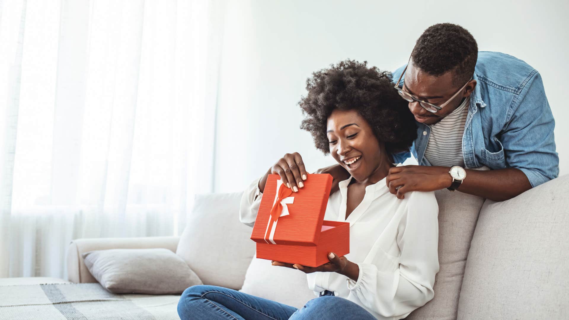 man regifting a present to his partner