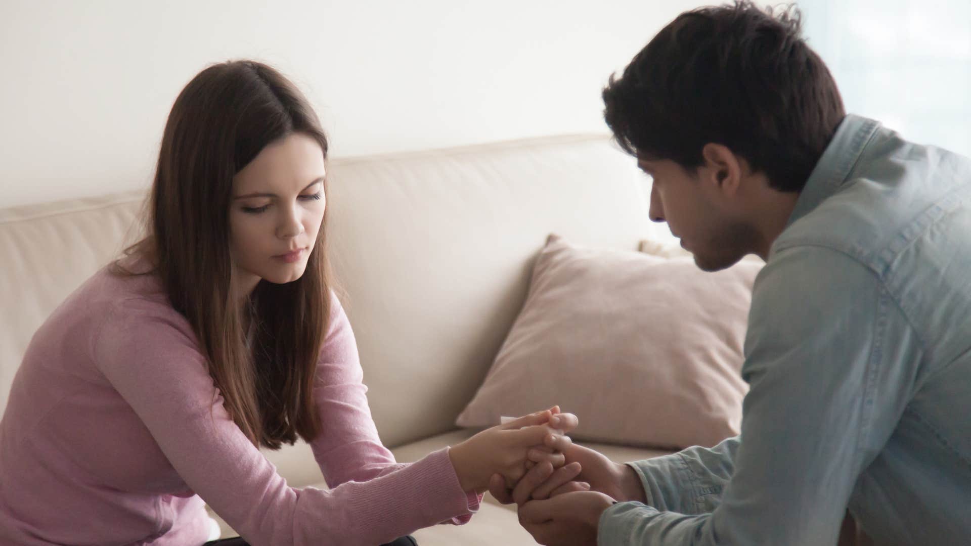 a man tells his female friend that they cannot hang out anymore because he now has a girlfriend