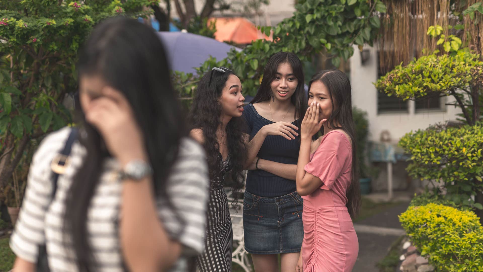 a group of friends tell a mean joke on their friend and are mad that she is mad