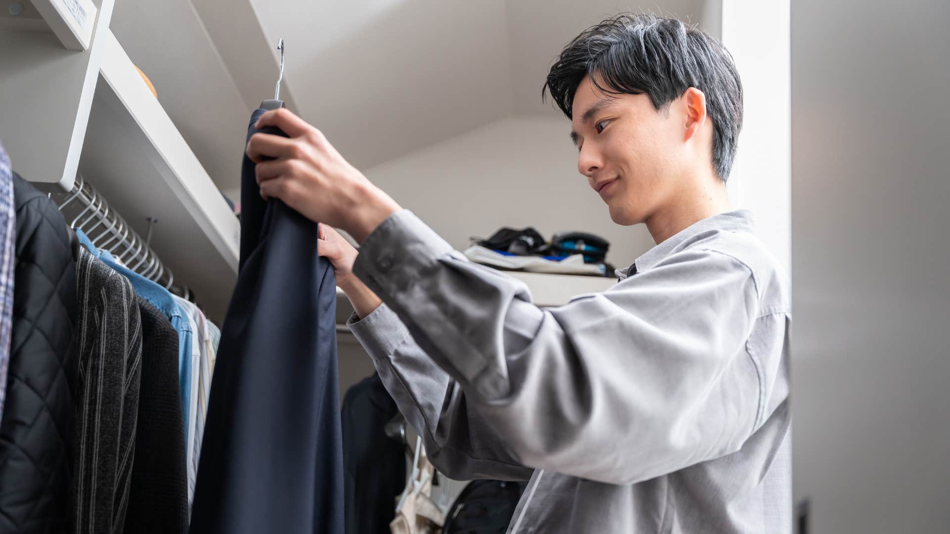 a man has clothes that he has never worn before