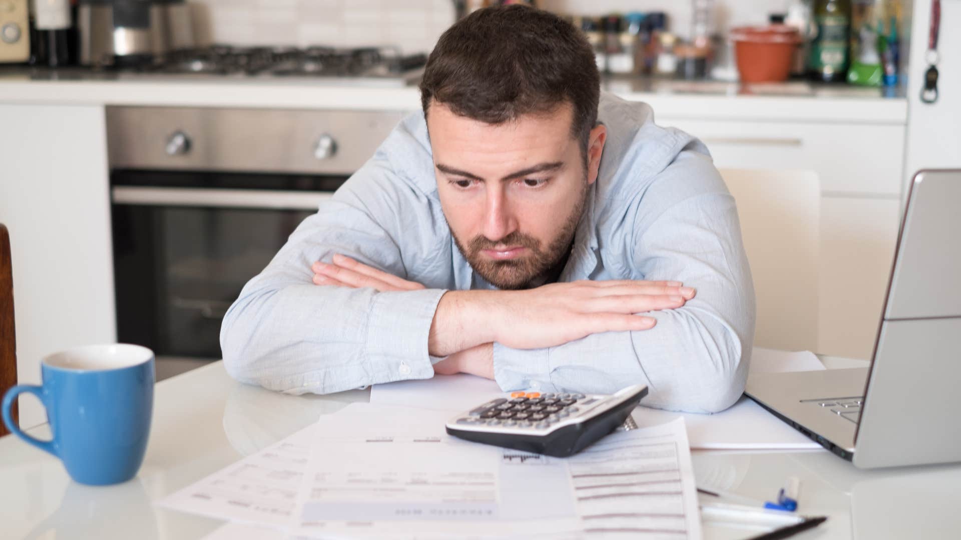 a man goes through his unpaid bills and how much the late fees are going to cost him