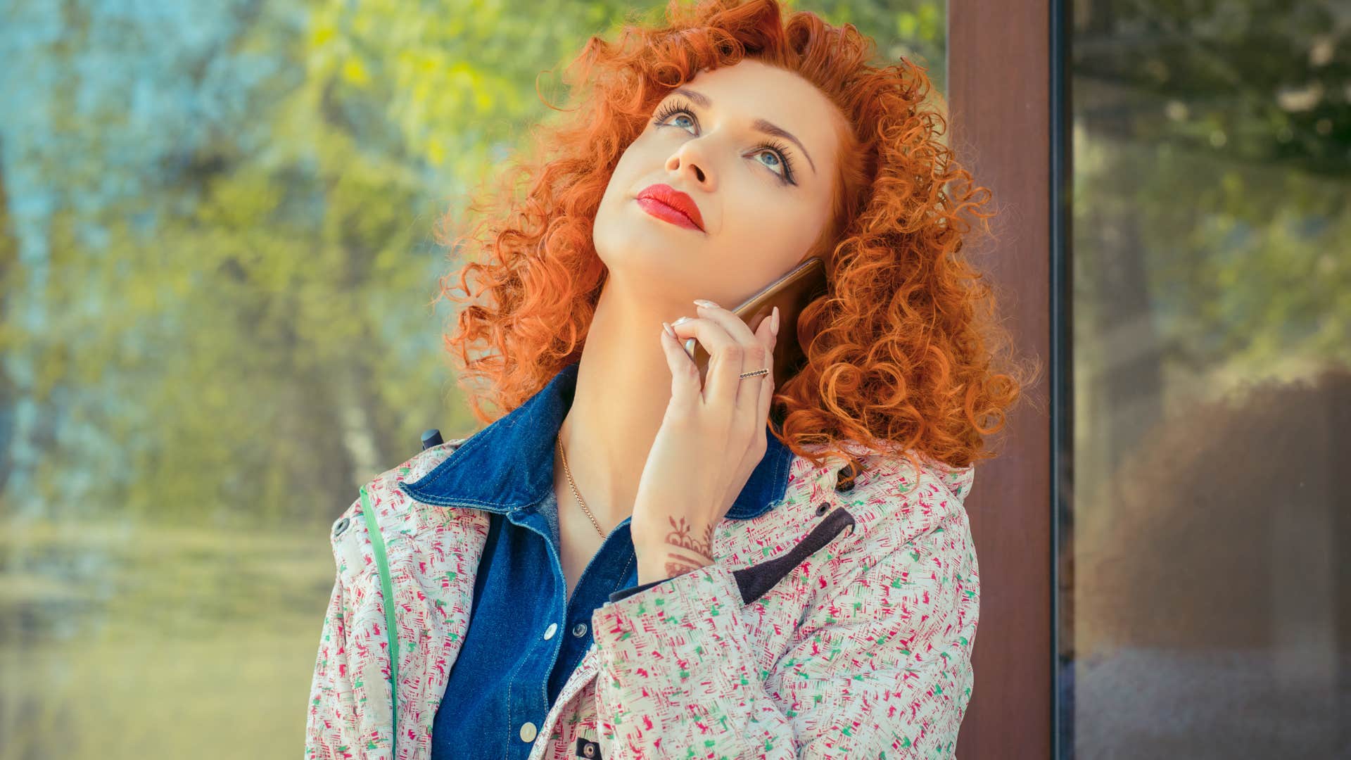 passive-aggressive woman rolling her eyes on the phone