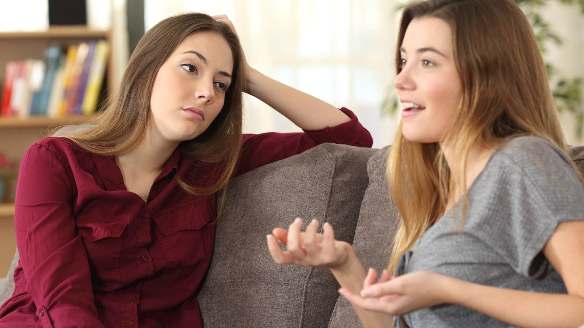 woman listening to superficial friend talk
