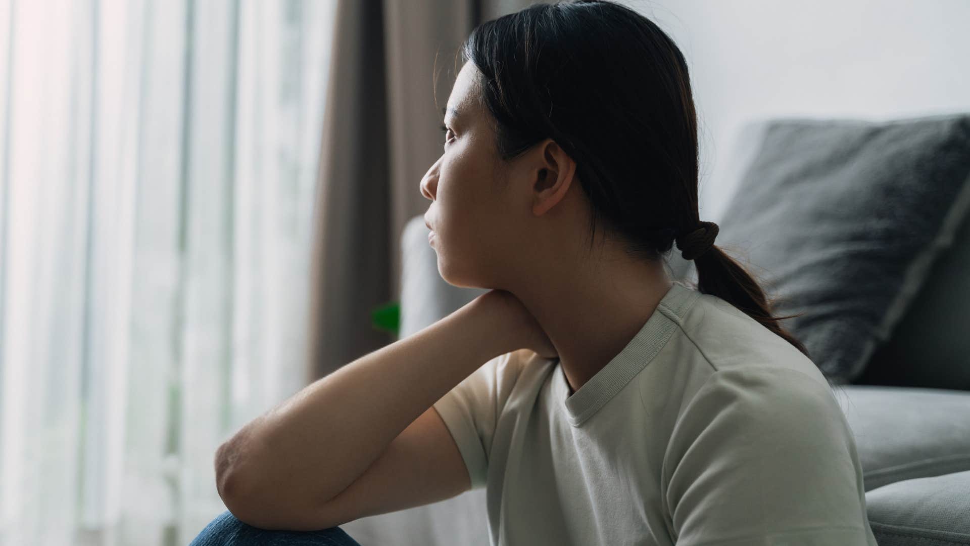 Woman looking around a house where everything feels sterile.