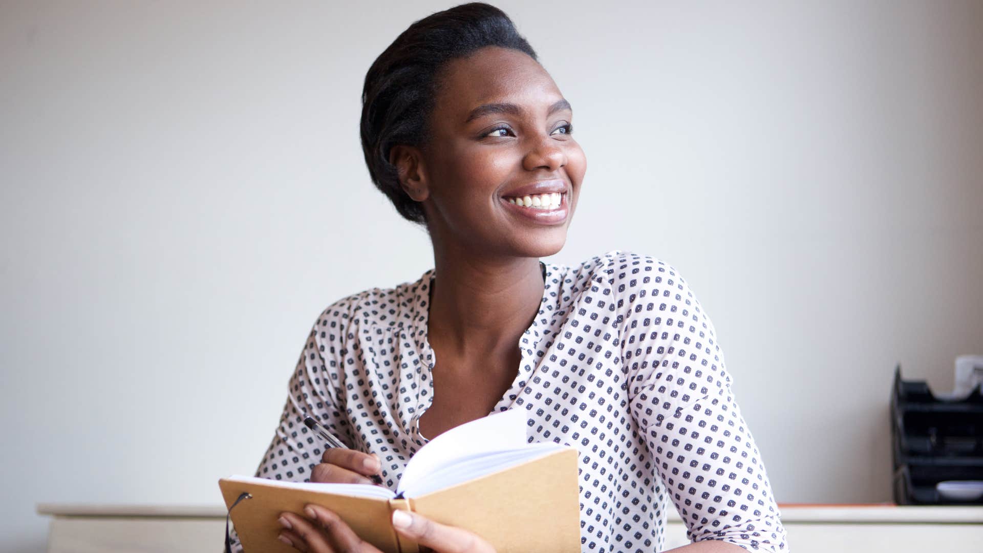 young woman keeping a diary