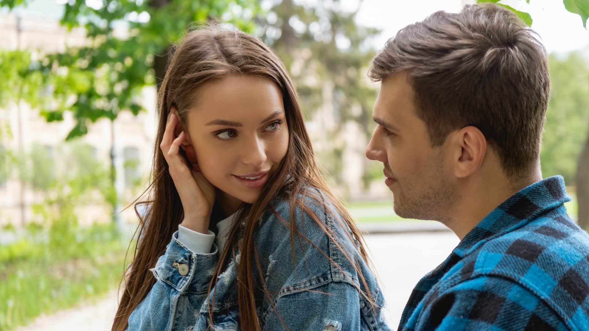 man looking for validation outside the home as he flirts with woman
