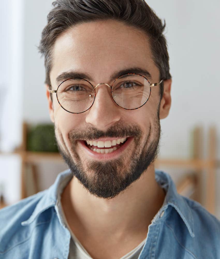 Man in love raises eyebrows slightly