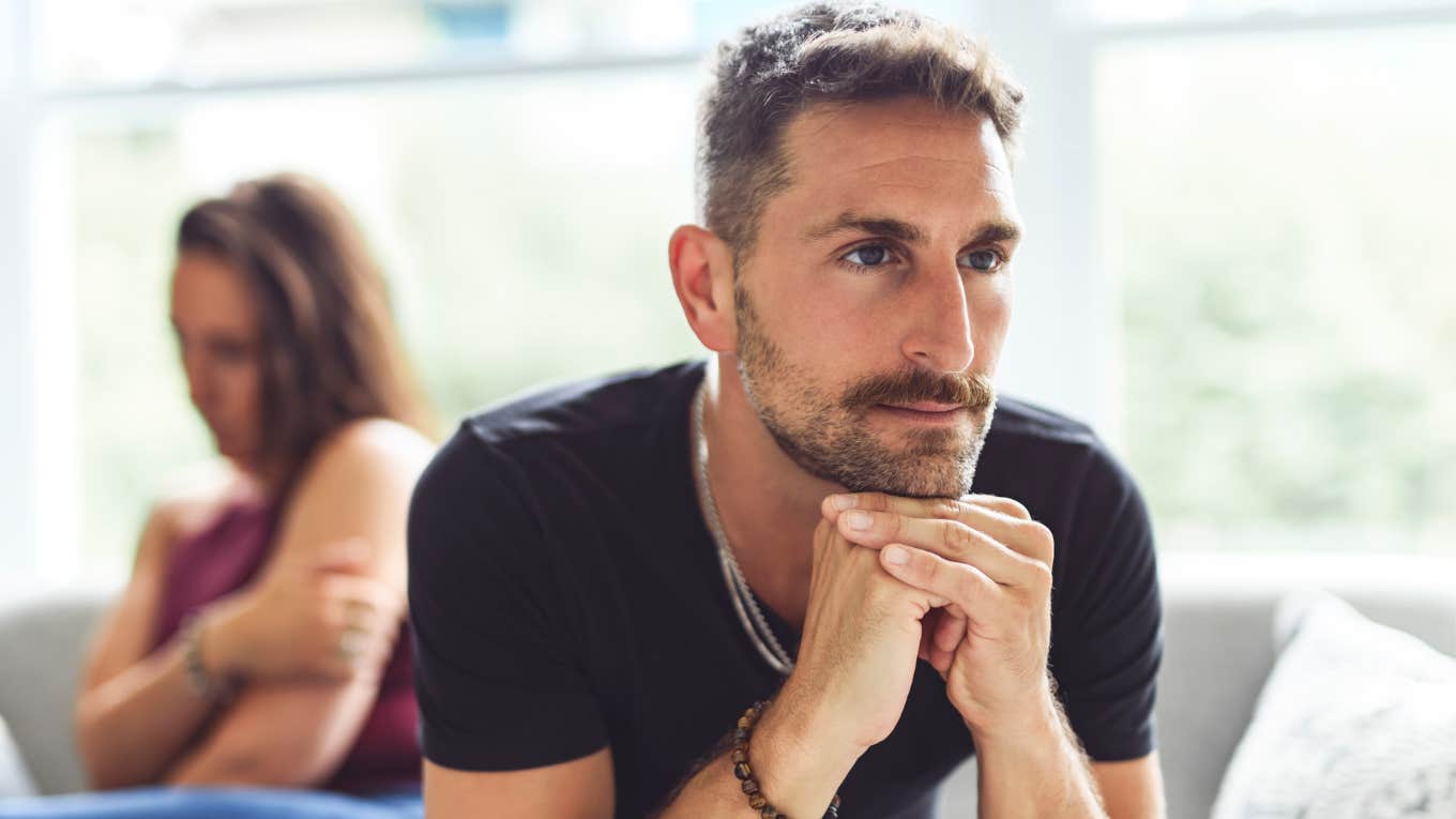 man feeling lonely in his marriage turned away from wife