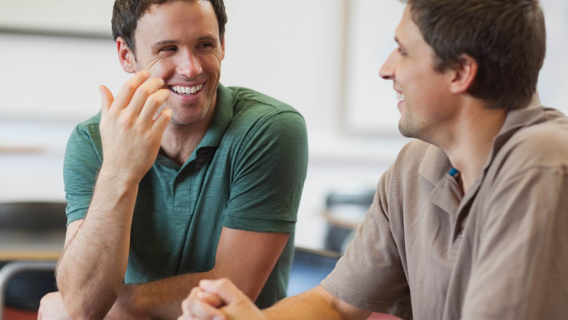 man speaking highly of his wife to his friend
