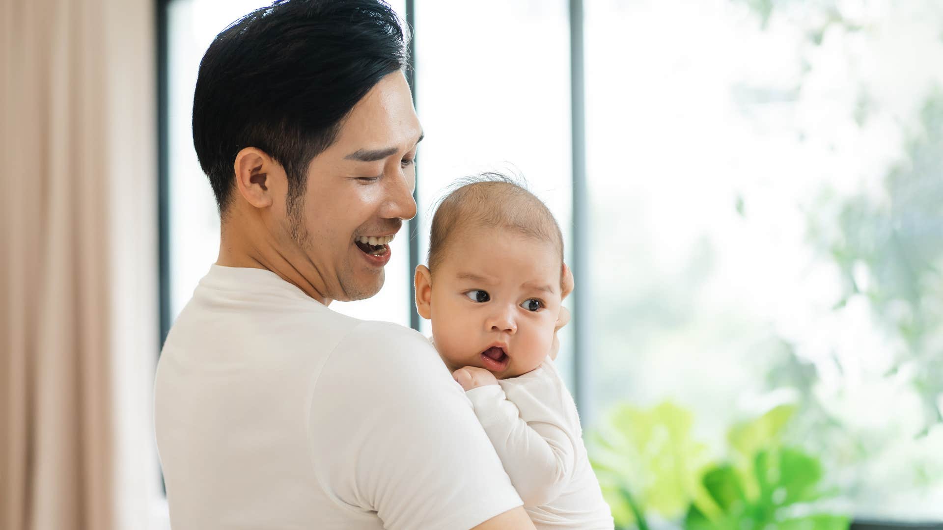 dad taking care of baby