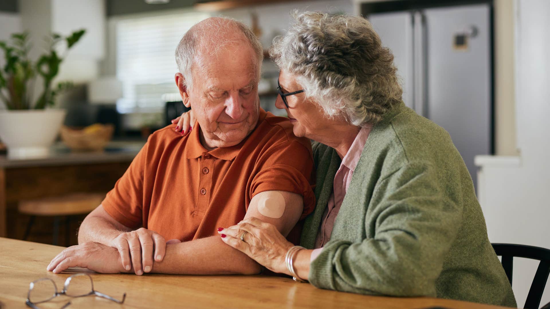 older man sitting next to his wife and accepting her flaws