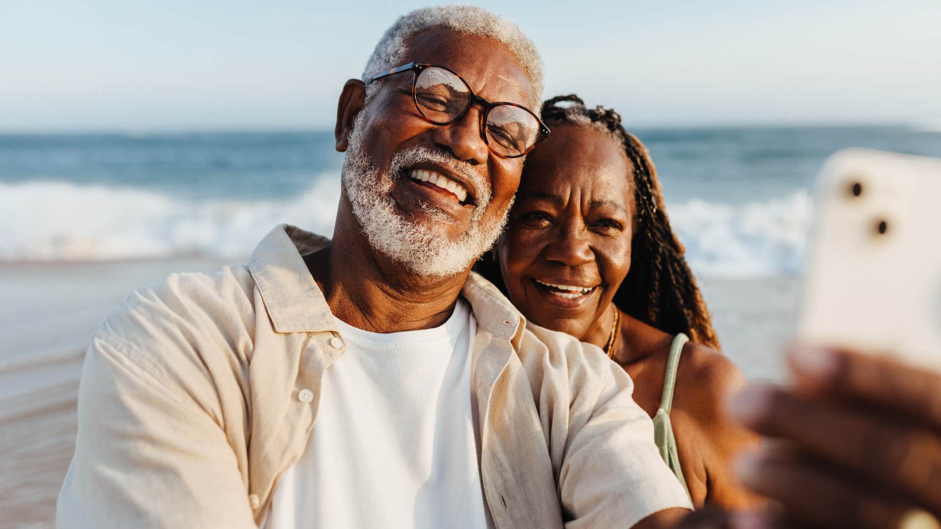 older couple who's been through a lot together smiling