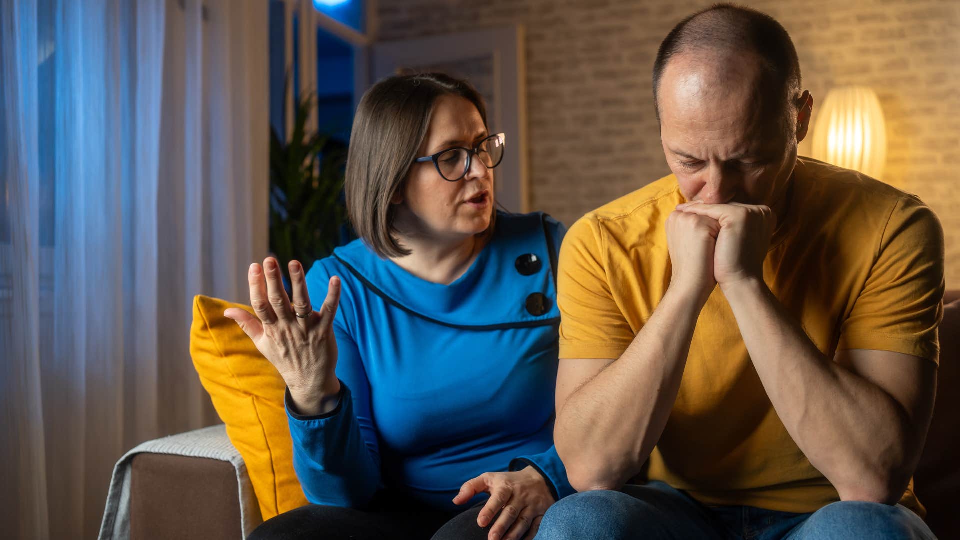 Man saying "I need to focus on myself" to his upset wife.