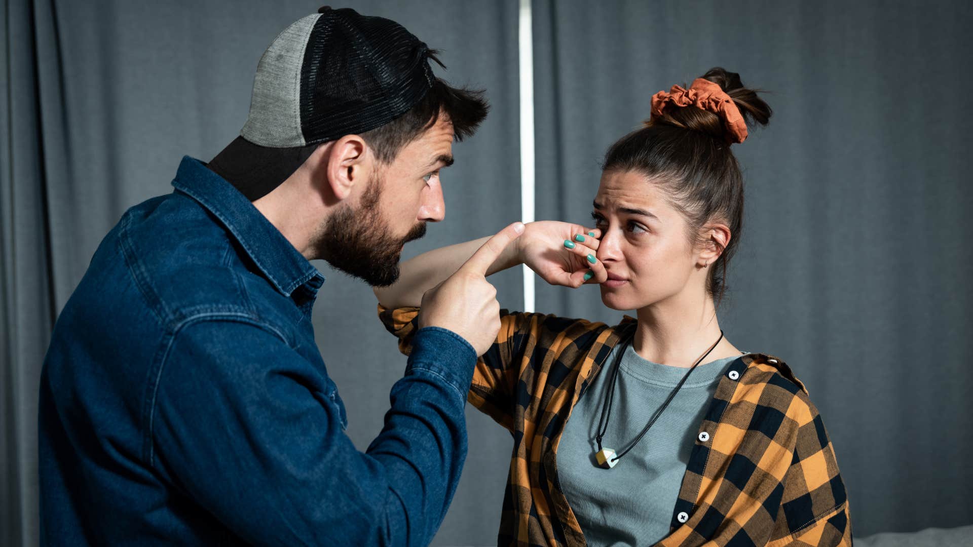 man criticizes his wife because he resents her