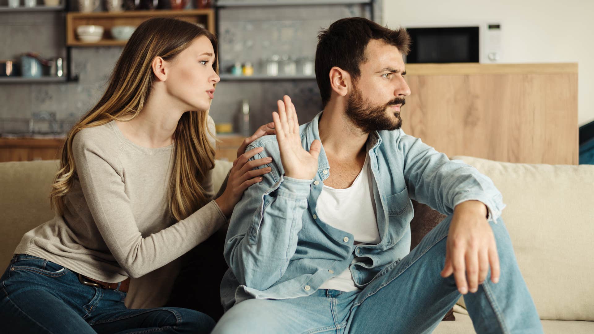 man stops showing affection to his wife at home because he resents her