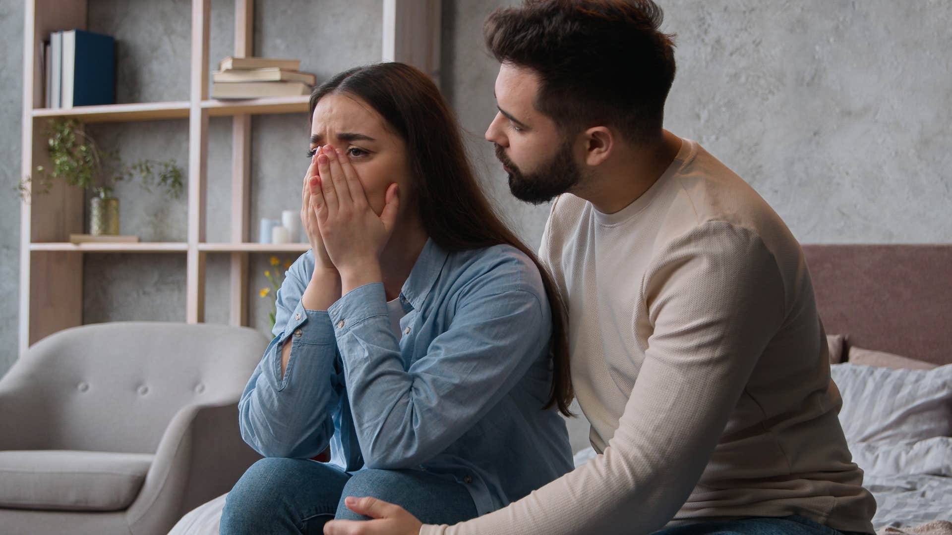 Man who can admit when they're wrong comforting his wife.