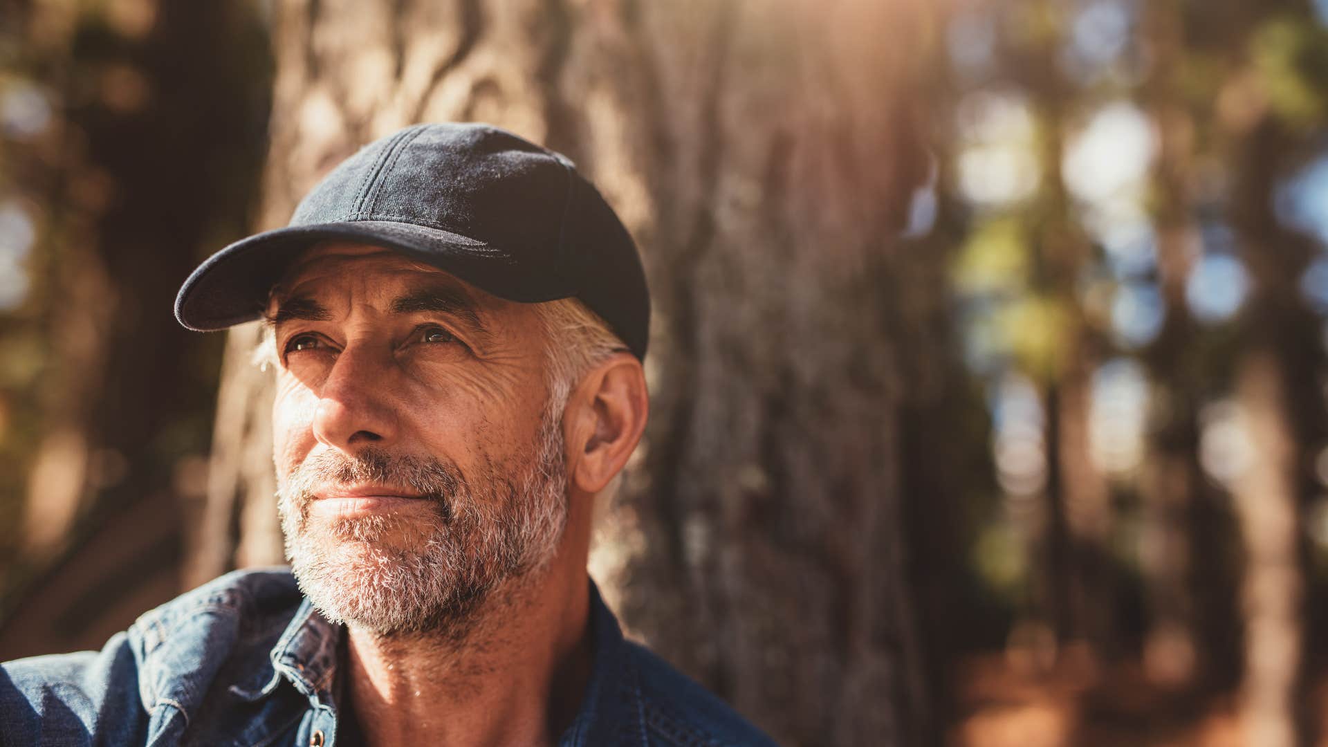 older man sitting outside