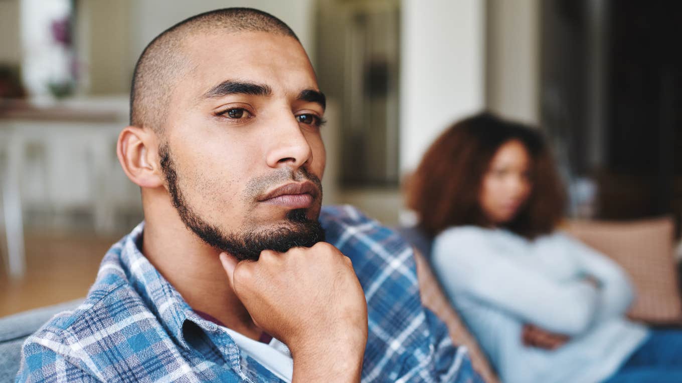 man with a broken heart turned away from wife