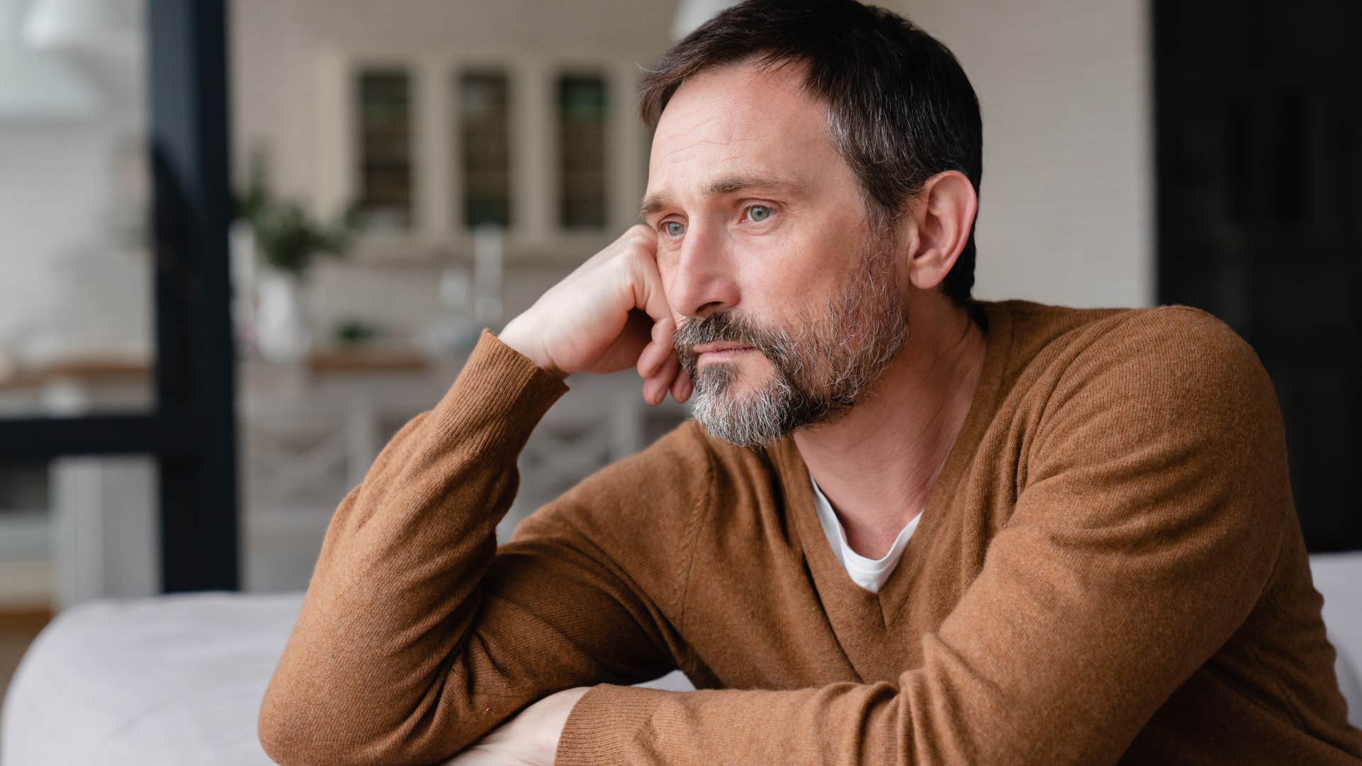 upset man feeling unheard at home