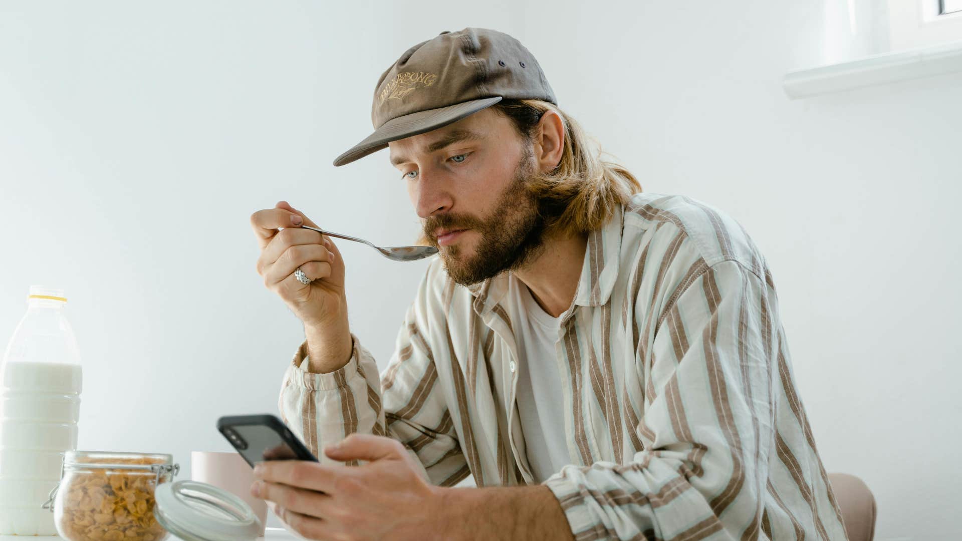 man who is self-disciplined eating breakfast