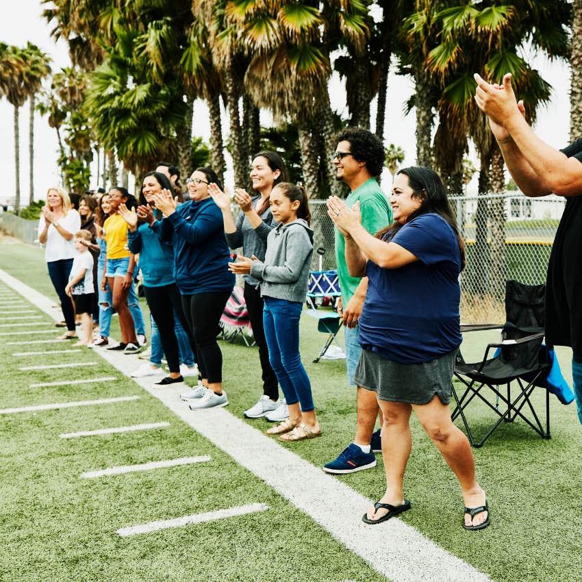 parents on sidelines at a kids' soccer game