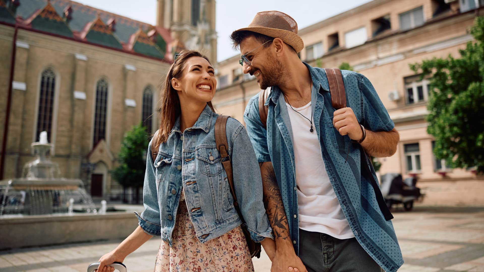 woman makes things unforgettable as she smiles and looks at man