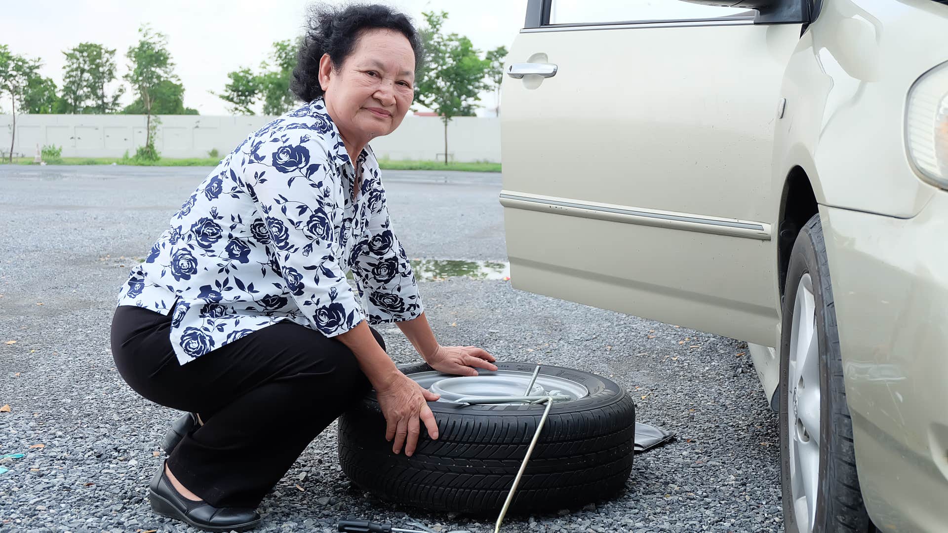 person over 60 still does the household task of Changing car tires, making them exceptionally strong
