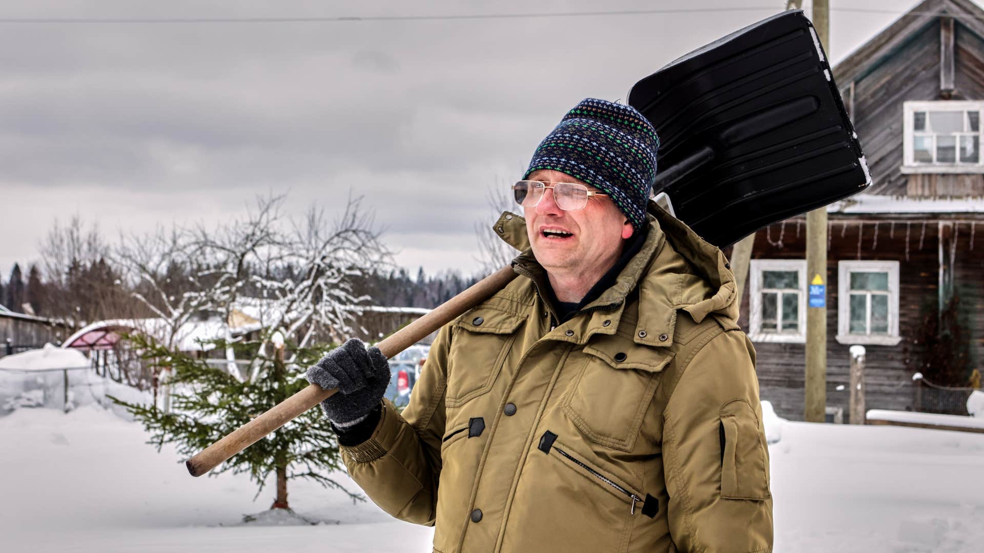 person over 60 still does the household task of Shoveling snow, making them exceptionally strong