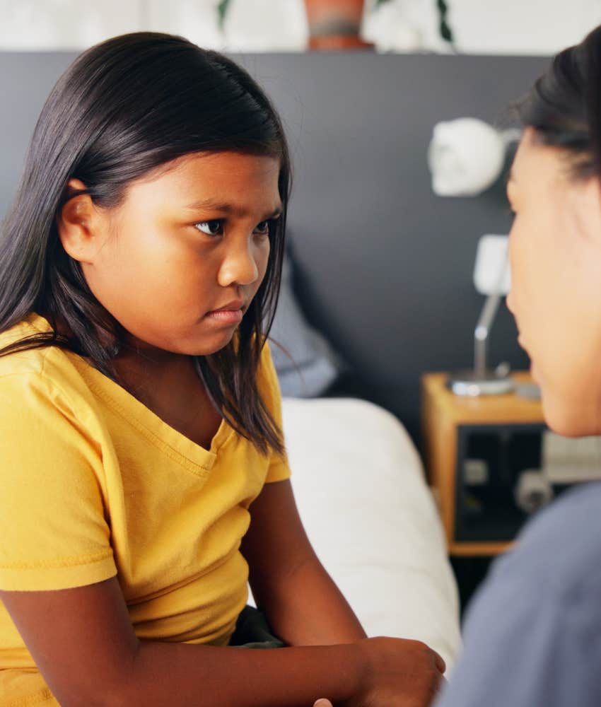Parent teaches daughter about happiness