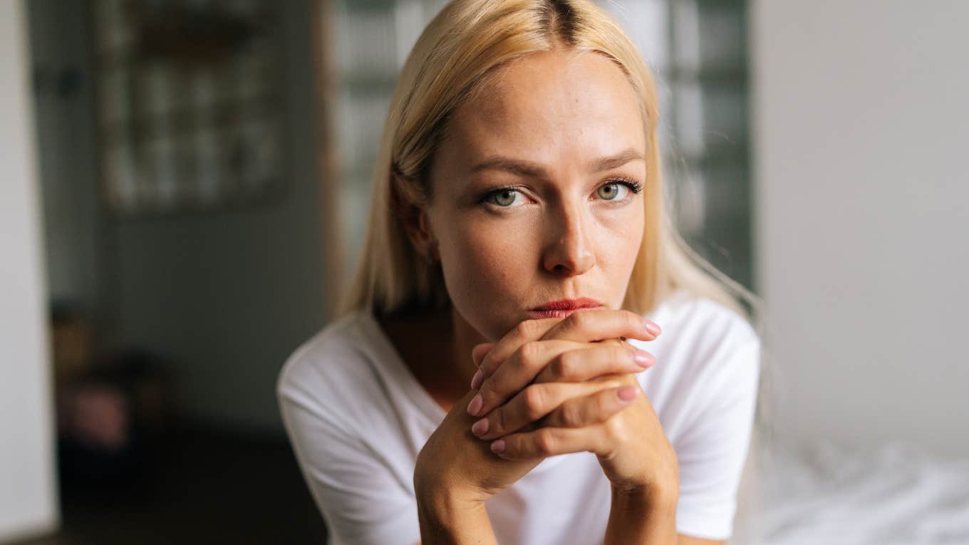 sad woman self-sabotaging her life
