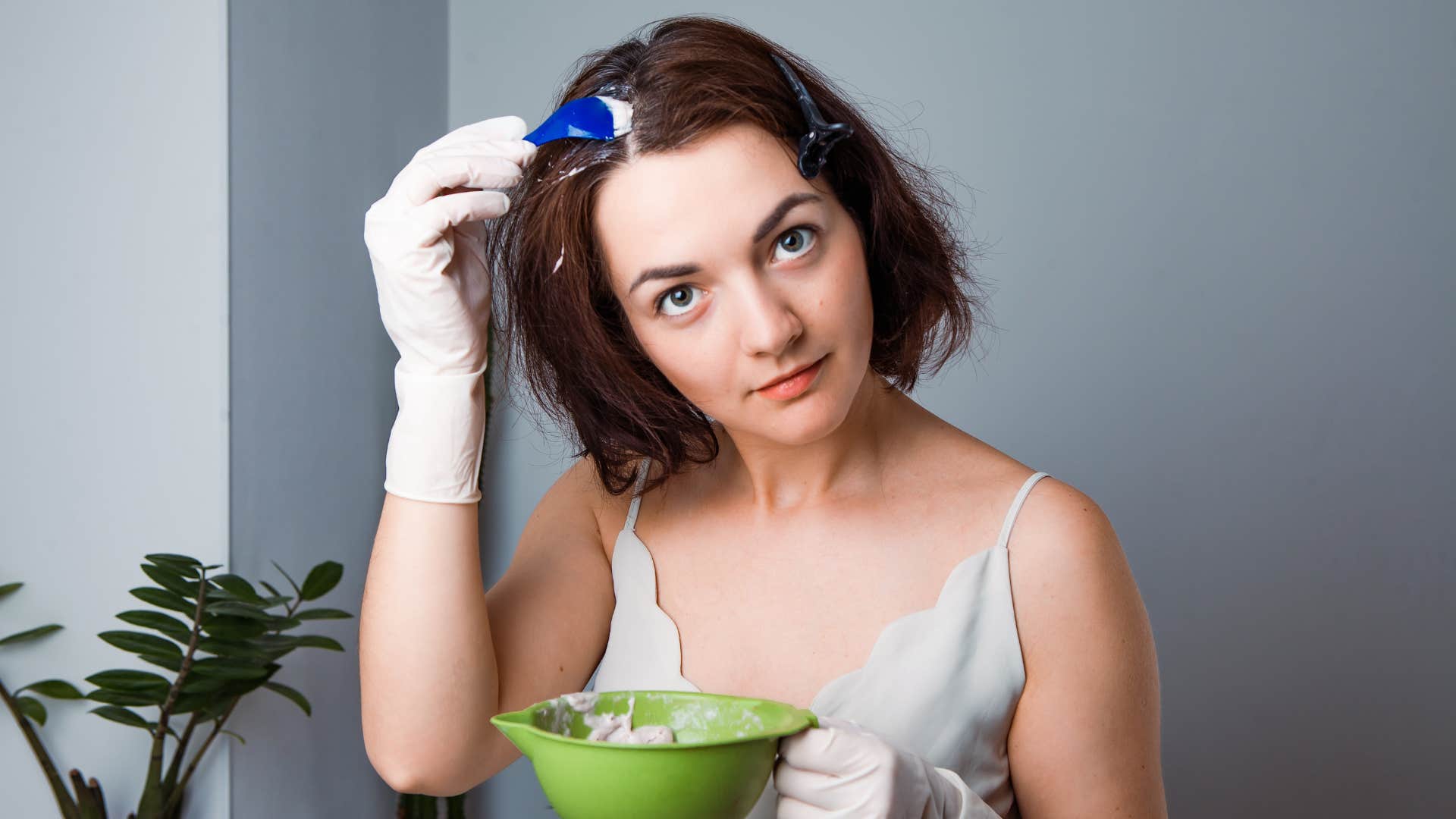 woman dyeing her hair a different color