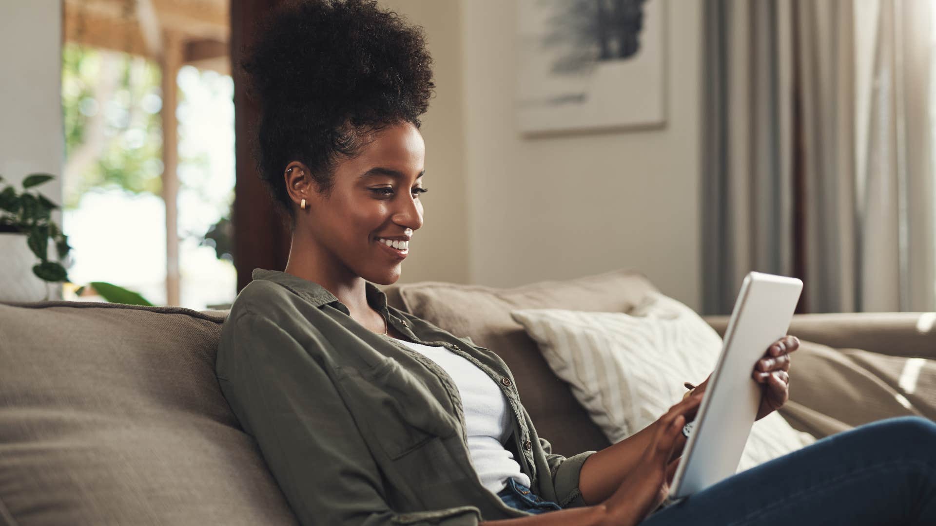 woman shopping online using tablet
