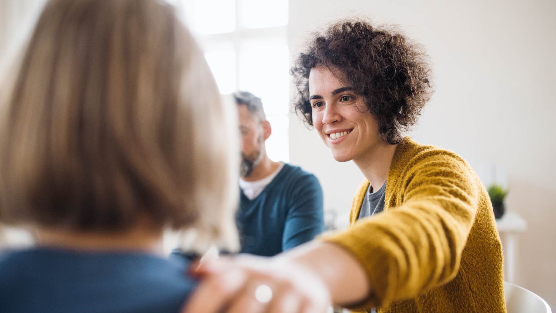 woman talking to friend about life milestone