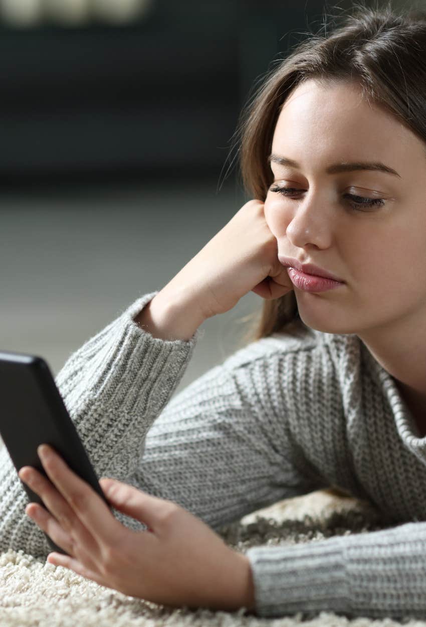 woman waiting for a text from her situationship