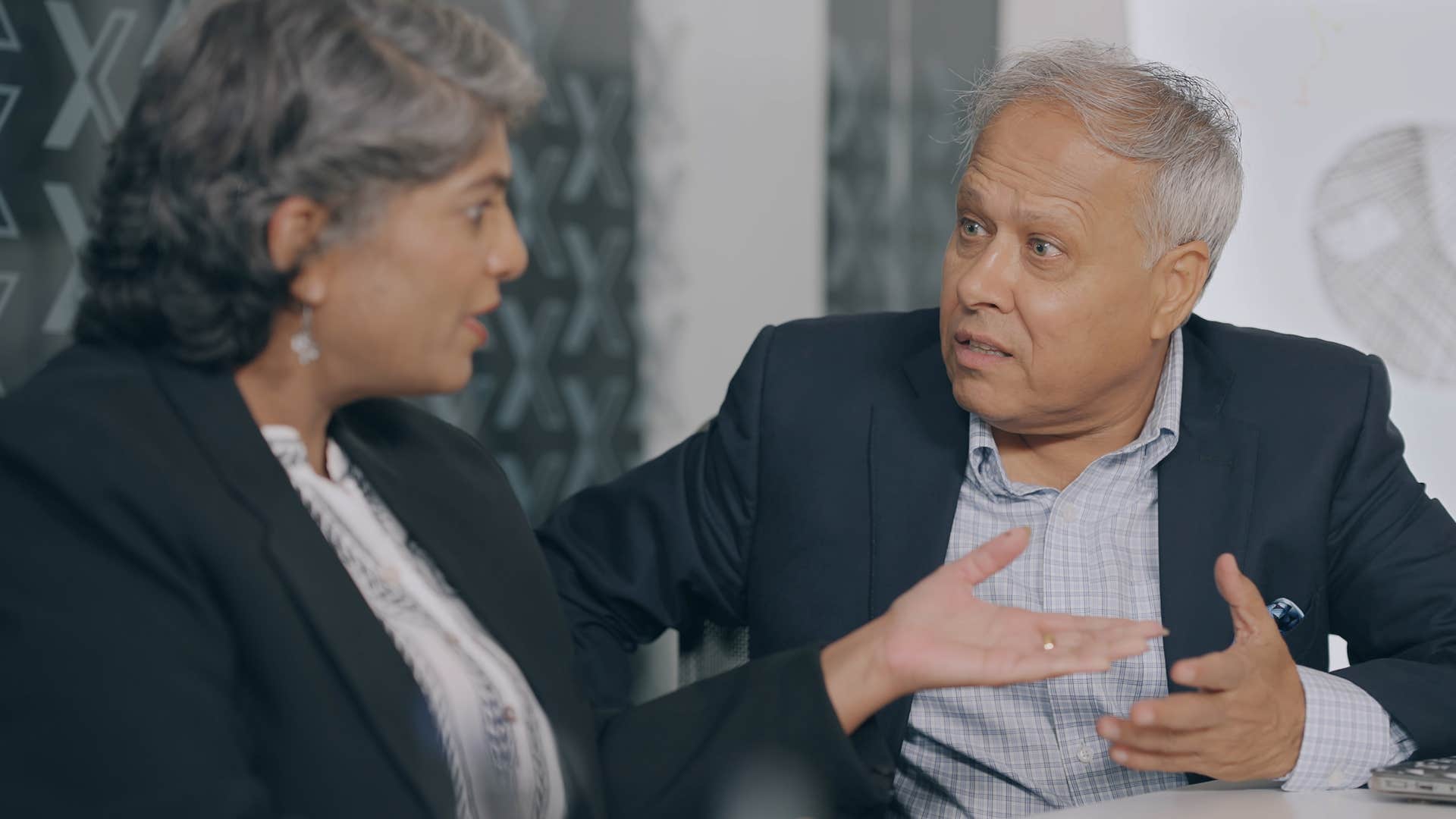 Woman saying "you don't understand" to her colleague.