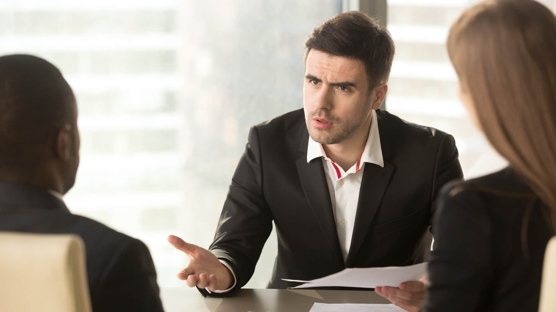 Man saying "you're not perfect" to his boss.