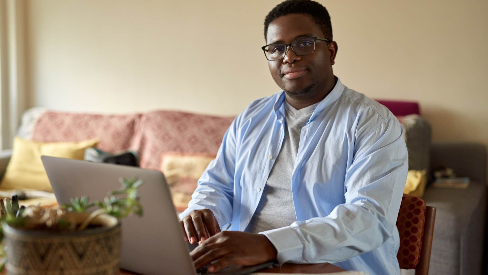 Man who does their own research working at home.