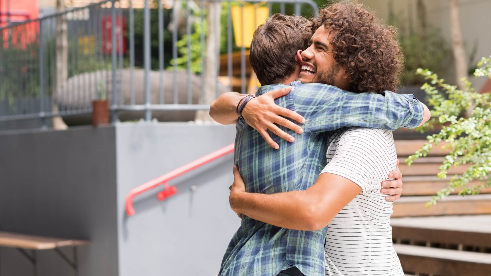 a man and his childhood friend embrace each other after experiencing so much together