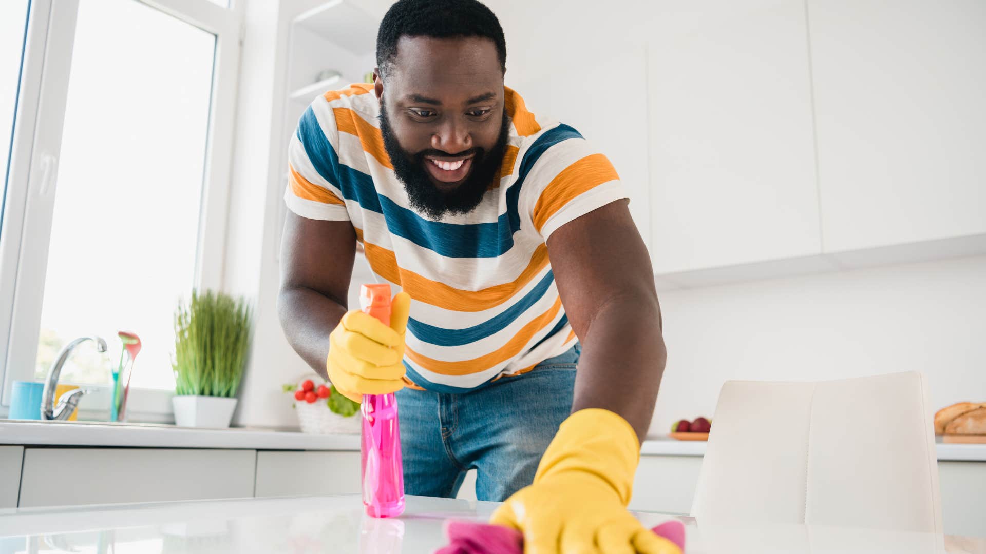 man who keeps home spotless by choosing solution