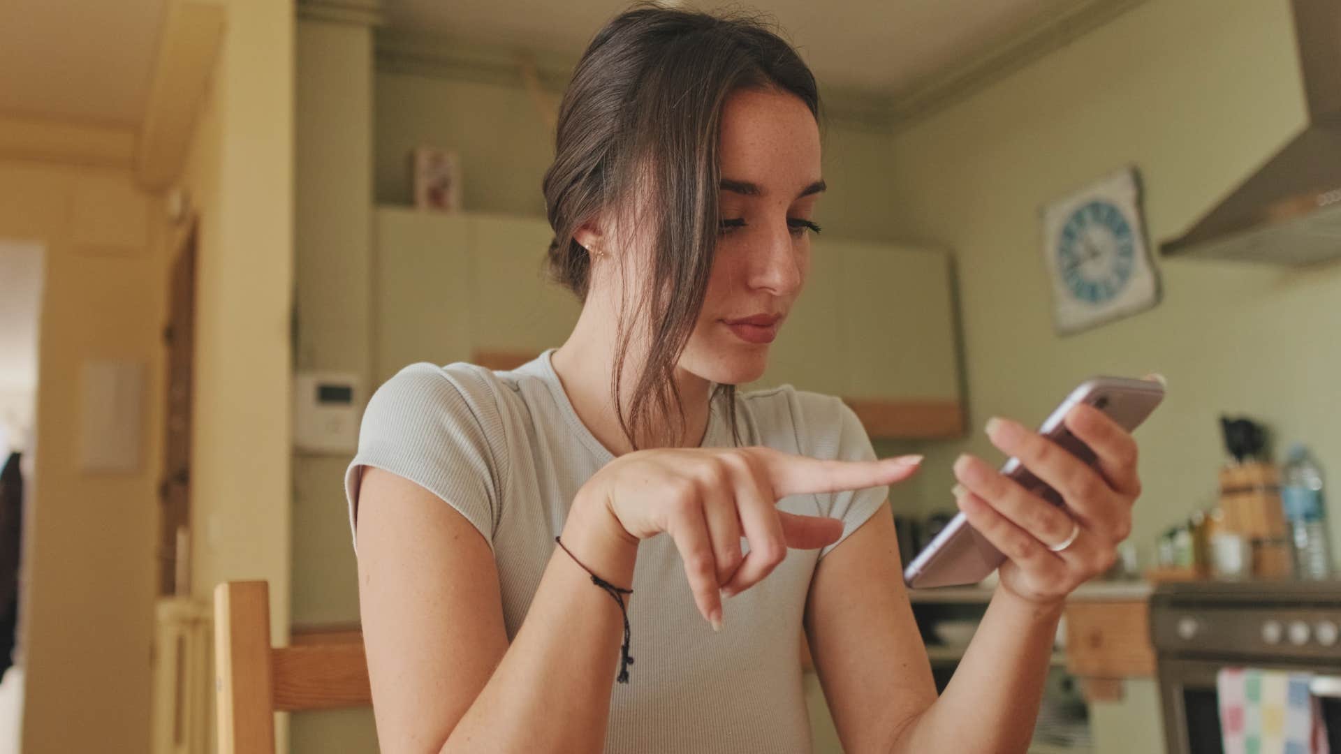 woman following trends and scrolling on her phone