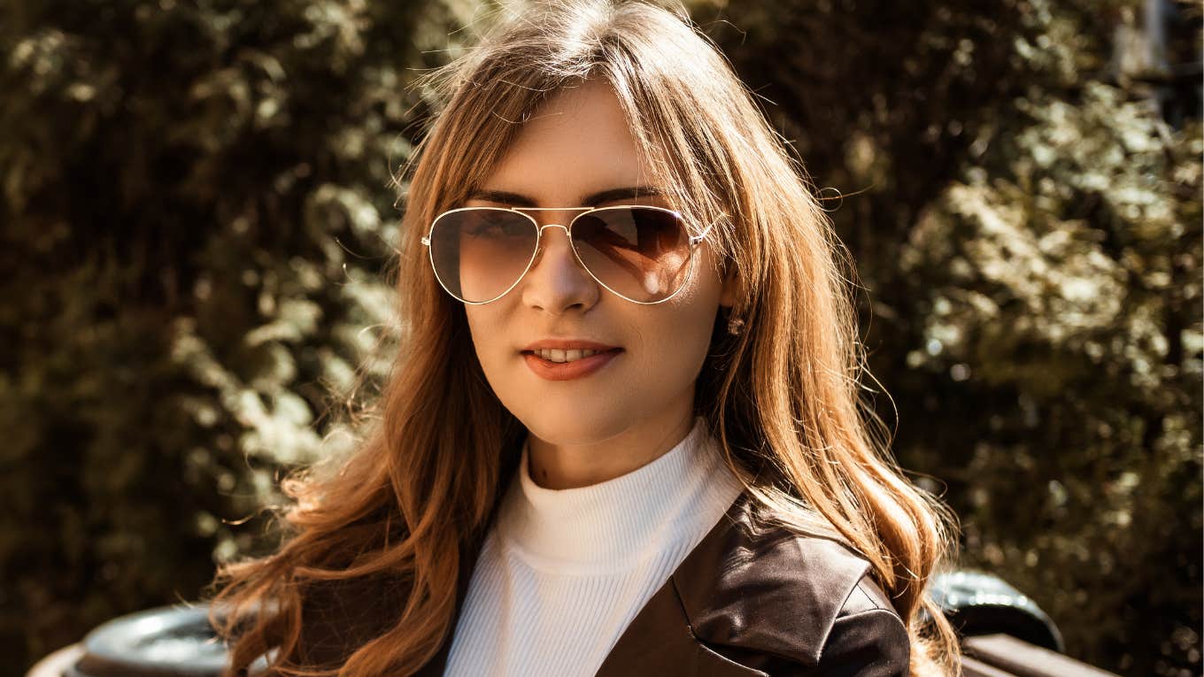 fashionable woman unworried about financial struggles