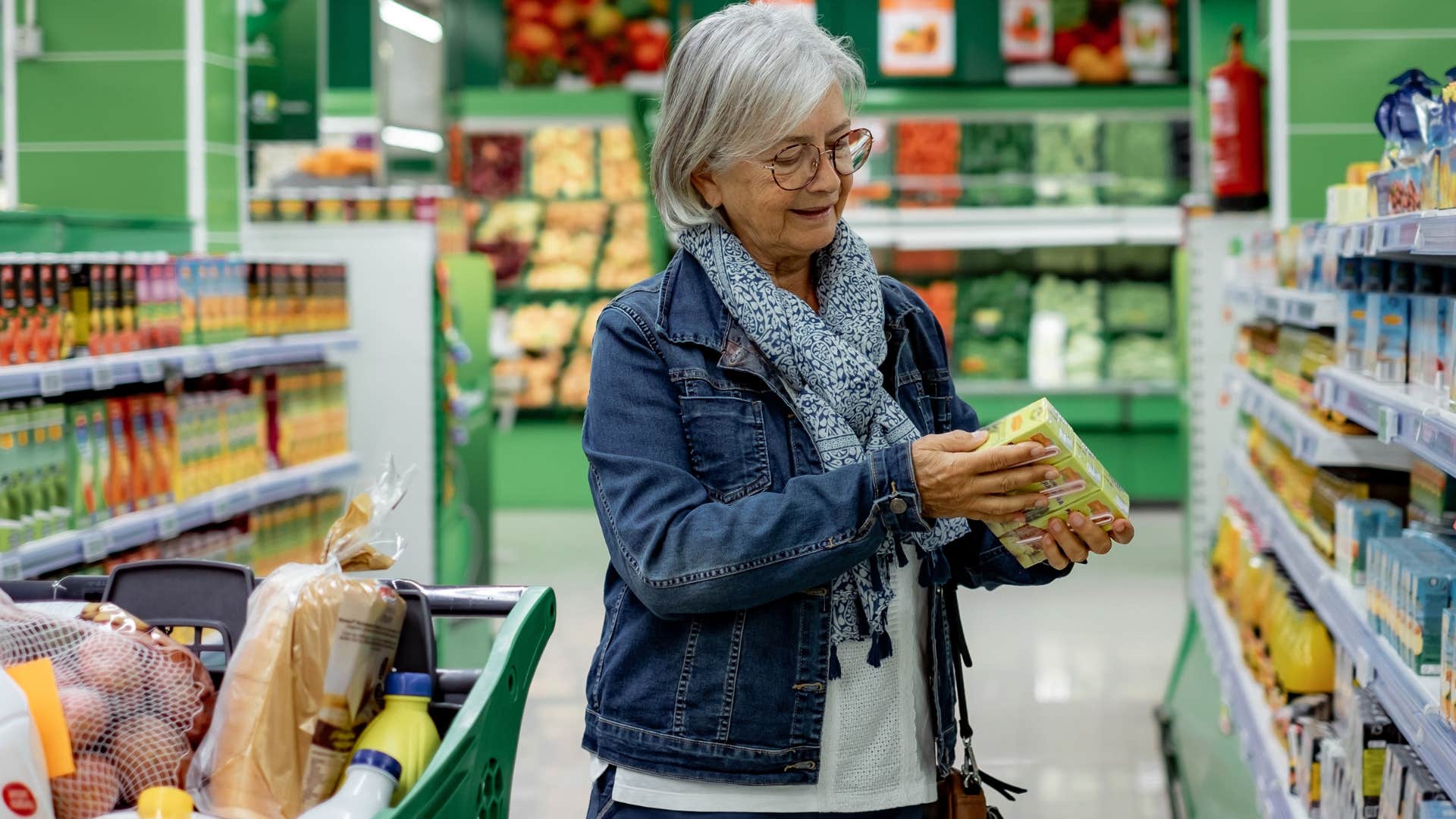 woman buying name-brand products in the grocery store