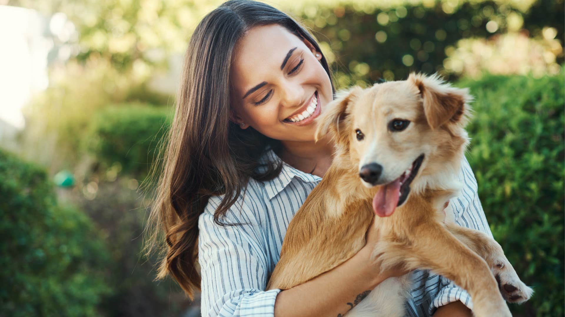 woman whose other relationships feel superficial hugging her dog