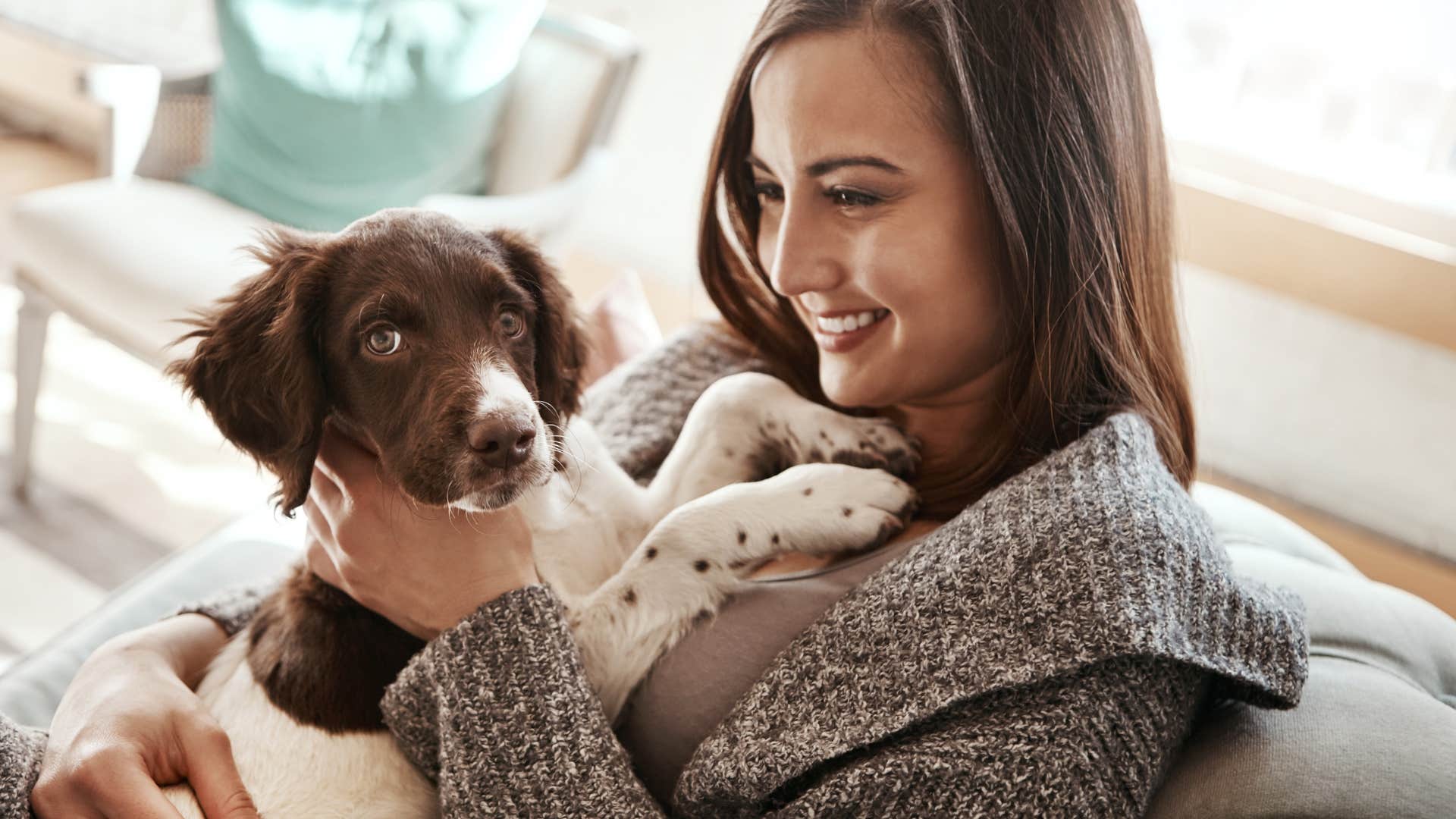 woman who values alone time sitting with their dog